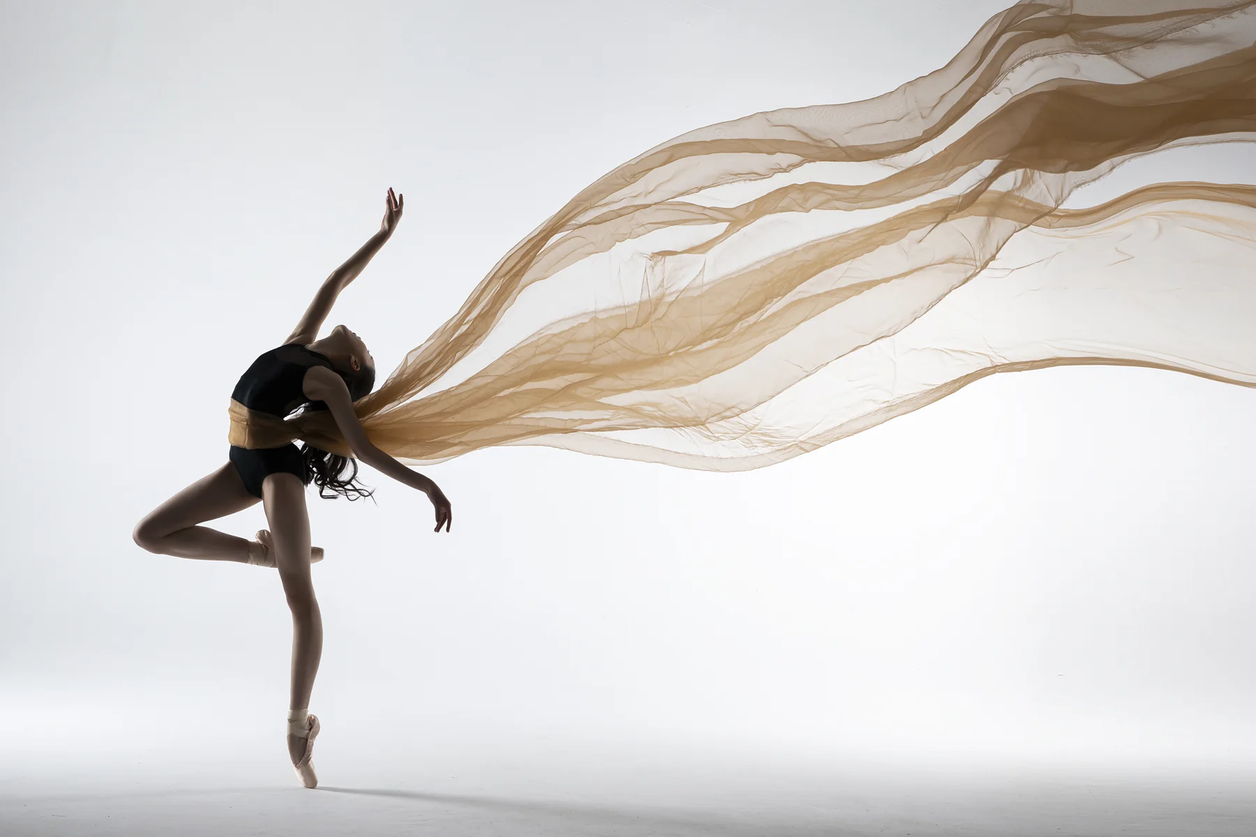Ballet studio photograph with flowing fabric